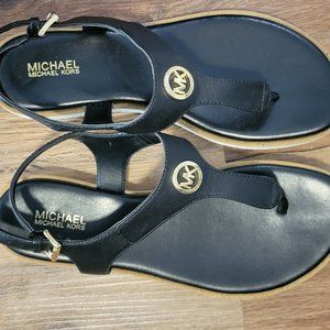 Michael Kors Size 6 Black and Gold Sandals